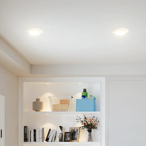 Bulk 24 Count 5 By 6 Inch Led Disk Lights With Smart Dimming Controls For Seamless Flush Mount Ceiling Disc Swap Featuring Crisp Warm White Glow And No Sweat Setup On Any Old Recessed Housing illuminating a modern room.