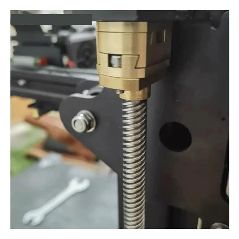 Upgrade Your 3D Printing Game With This Smooth Oldham Coupling For T8 Z Axis Lead Screws Perfectly Fit For EndERS 3 Flexible Hot Beds With Easy 16mm Thread Holes And Reliable Brass Build Quality For Flawless Moves. Brass oldham coupling on a T8 Z-axis lead screw for 3D printer motion