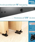 Close-up of Heavy Duty 6 Foot Single Track Bypass Barn Door Hardware Kit components, showing black carbon steel rail and door brackets.