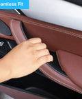 Hand installing Door Handle Cover Set for BMW X5 F15 2014-2018 and BMW X6 F16 2015-2018 in black for a sleek upgrade