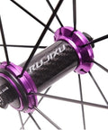 Close-up of purple carbon hub on Lightweight 700C Road Bike Wheelset With 40mm Rim And Quick Release Rim Brake Carbon Hub For 7 8 9 10 11 Speed Cassette