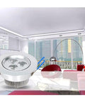Silver Adjustable LED Recessed Spotlight installed in a modern living room, highlighting the stylish interior decor.