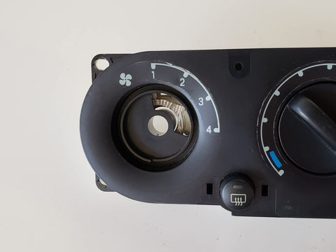 Close-up of Ford Black HVAC Temperature Control Panel With Push Button Rotary Actuator And Manual Operation Genuine Ford Part Replacement Climate Control Module For Ford Vehicles 1L2Z19980AA showing fan speed dial.