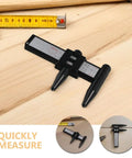 OHPHCALL 2pcs Wheel Hub Diameter Ruler ABS Measuring Tool for Automotive on wood surface for quick measurements.