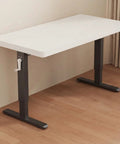 Zero Hassle Height Adjustable Standing Desk With Bulletproof Steel Frame And Chunky Desktop Built Tough For Everyday Home Office Grind And All Day Sessions seen from the side.