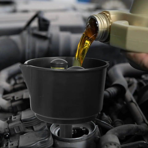 Heavy Duty Universal Fuel Filter Funnel With Tough Mesh Screen 12 Gpm Gas Diesel Water Separator pouring liquid into funnel.