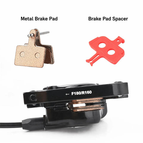 Complete Hydraulic Disc Brake Conversion Kit For Mountain Bikes With Two Ventilated Steel Rotors And Heavy Duty Metal Levers showing metal brake pad and spacer