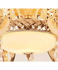 Stunning European Crystal Chandelier Featuring Pink Flower Accents Warm Led Ceiling Pendant Light Luxe Fixture For Living Room Or Hotel With Adjustable Chain To Slay Your Space Decor, close up view of golden base and light.