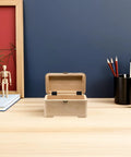 Open wooden box on a desk with 20 Piece Iron Hinge Set For Jewelry Boxes And Bookcases Multi Fold Three Fold Corner Design