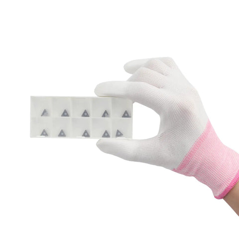 Built Damn Tough Triangle C Angle Cutter Heads Compatible With Pneumatic Chamfering Machines, held in hand, showing storage case with ten blades.