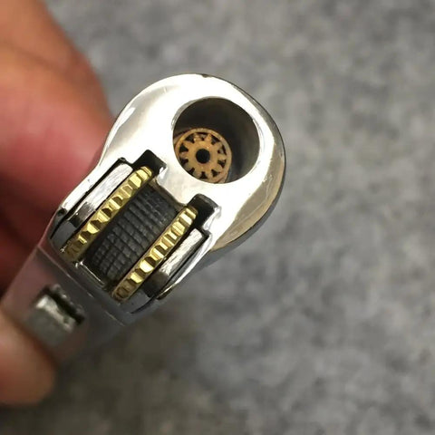 Close-up of Windproof Jet Torch Lighter With Locking Flame Viewable Flame Butane Cigar And Cigarette Lighter Portable Silver Metal Torch