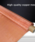 Copper Mesh Screen 100 Mesh 1x1m For EMF Shielding And Impurity Filtration, rolled view of dense copper wire mesh on black background