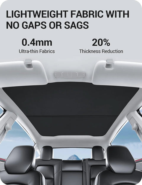 Tesla Model Y sunshade roof with black fabric, foldable UV protection, no-gap design, interior view.