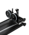 Rock Solid Rotary Attachment For Precision Engraving And Wood Carving freestanding motorized axis with dual rubber wheels and metal build.