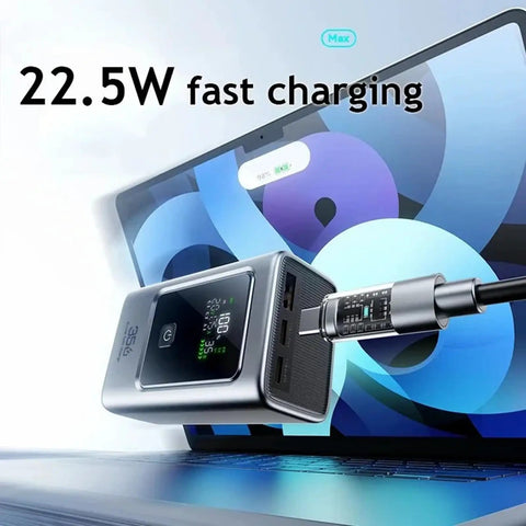 Rugged 35 Watt Fast Charging Power Battery Case With Type C And Usb Ports For Phones Laptops Hella Compact Build shown charging a laptop.