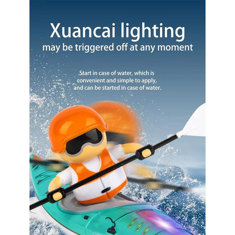 Colorful toy figure paddling 2.4G RC Kayak With Paddling Propulsion And Anti Capsize Design on water