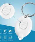 White Mini Keychain LED Flashlight with stainless steel key ring for nurses, displaying button detail. 2.6 inch pocket size.