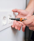 Using 117 In 1 Precision Screwdriver Set with Torx Triwing Bits to repair a wall socket, showcasing multi-purpose tool kit.