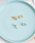 Two Pack Magnetic Locking Clasps With Rhinestone Lobster Clasps for jewelry making, shown on a blue plate, gold and silver options visible.