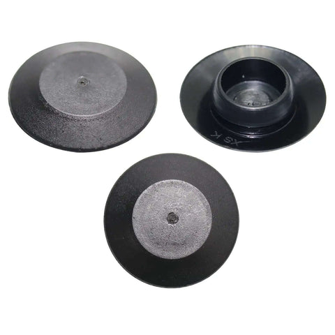 Close-up of black plastic hole plugs from 141 Piece Auto Body Black Plastic Hole Plugs Kit Pro Grade with flush and button styles.