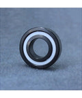Top Tier Silicon Nitride Full Ceramic Ball Bearings Model 6009 With PTFE Cage And 45X75X16MM Specs, showcasing ceramic design.