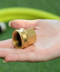 Solid Brass Garden Hose Adapter Set With Quick Swivel Double Female Fittings Three Quarter Inch GHT To One Half Inch NPT Female Leakproof Easy Hand Tighten Install Outdoor Watering shown in hand