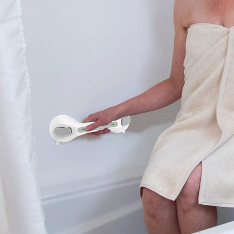 Person using 12 Inch Gray Suction Grab Bar With Indicators 2 Pack No Drill Shower Handrail for Bath Tub for elderly safety