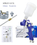 Lightweight Pneumatic Hvlp Spray Gun With 0 8 And 1 0 Mm Nozzles For Sweet Automotive Finishes kit showing 0.8mm nozzle, clear paint reservoir and parts.