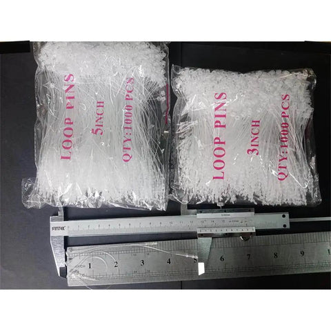 2000 Piece Bulk Clear Plastic Hang Tag Fasteners With Quick Snap Security Loops For Retail Stores No Sweat Setup Durable Polypropylene Price Pins 3 Inch 5 Inch Straight Up Apparel Hanging Kit displayed in bags with a ruler.
