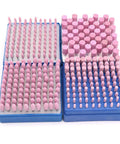 Top Shelf 100 Pack Tough As Nails Abrasive Cone Grinding Stone Points For Electric Rotary Drill Bits arranged in two blue trays.