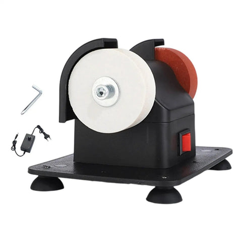 Slick Compact Mini Bench Grinder Featuring Dual Twin Wheels For Rapid Tool Sharpening Heavy Duty Coarse Grinding And Smooth Shop Finishing Built Tough For Small Space Fixes And Daily Garage Hustle on a workspace with accessories.