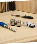 Workbench with tools and one Stainless Steel Roller Wheel Pulleys Set 4 Pack Pro Grade Beefed Up Heavy Duty Cable Pulleys For Kayak Anchor Trolley Marine Rigging Rope Bearing System Boat Sailing Hardware.