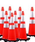 Eight 28 Inch Orange PVC Traffic Cones With Black Base in a group, showcasing heavy duty construction for safety use.