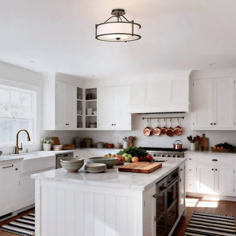 Three Light Drum Shade Semi Flush Mount Ceiling Light In Dark Bronze 18 Inch displayed in a modern white kitchen setting