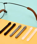 Soft Silicone Eyeglass Temple Tips Sleeve Retainer 8 Pairs No Slip Ear Grips on glasses with multiple colors displayed