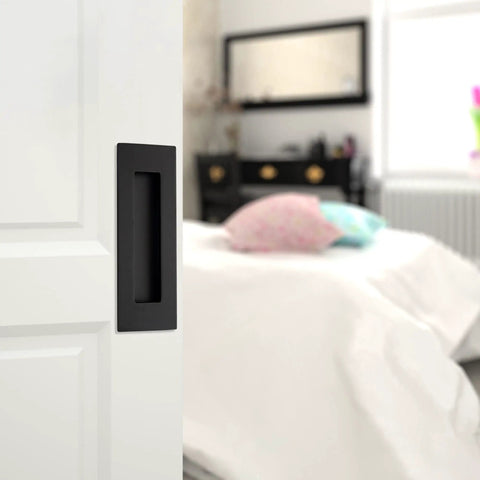 Knuckle Friendly Matte Black Recessed Pocket Door Handles Offer Zero Snag Edges And Dead Simple Screw Mounting Includes Four Finger Flush Pulls For A Clean Invisible Cabinet Or Closet Hardware Setup on a white door