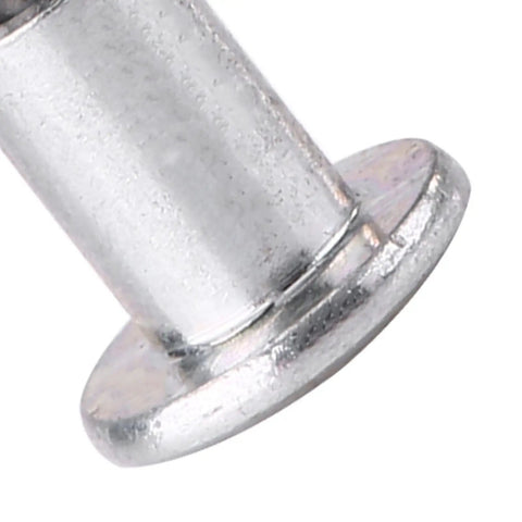 Close-up of a 9 mm tungsten steel tire stud screw from the 100 Piece 9 Mm Tire Stud Screws And Tough Tungsten Steel Snow Tire Spikes.