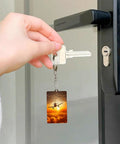 Hand holding key with Sunset Aircraft Plane Acrylic Keychain with chain and jump ring, lightweight bag charm for everyday carry