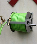 Heavy Duty Stainless Steel Garden Hose Reel Wall Mount Holder With Rolling Cart  green hose neatly coiled for easy outdoor use.