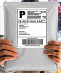Heavy Duty Weatherproof 12x15.5 Poly Mailers 100 Pack with label held by hands