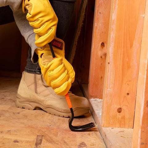 Worker using heavy duty 15 inch pry bar crowbar with curved claw and beefy nail slots forged carbon steel construction for prying