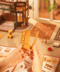 Hands assembling Charming Bistro Style Miniature House Kit With LED for Adults Beginners DIY Wooden Dollhouse Cozy Cafe Vibe