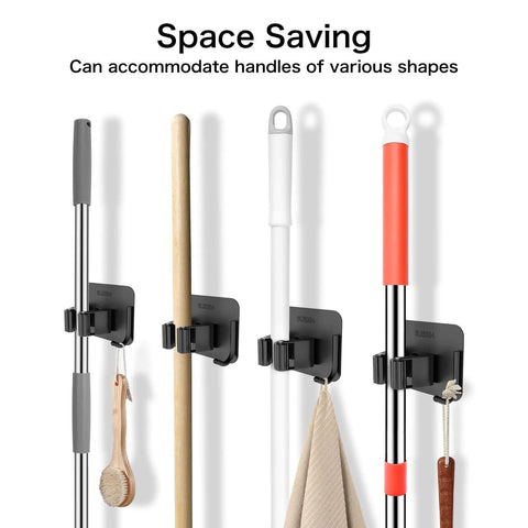 4 Pack No Drill Self Adhesive Broom Mop Holder Wall Mount With Hooks holding various cleaning tools on a wall