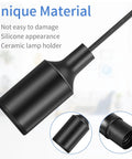 Close-up of black silicone E26/E27 lamp holder with cord from Ten Pack Hanging Light Cord With Switch for E26 E27 Pendant Socket Lantern Black 6 Foot Lamp Extension Cord Kit Includes Socket and Cord Durable Silicone Lamp Holder Flame Retardant Easy Install Plug And Play Ready.