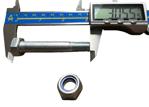 Digital caliper measuring a bolt and nut