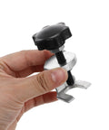 Hand holding Universal Windshield Wiper Arm Puller And Bearing Removal Tool For Vehicle Repair And Automotive Maintenance.