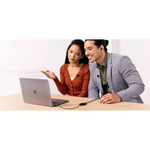 Two people using Ultra Compact Dual Channel USB Audio Interface For PC Mac iPhone iPad And Android with laptop and earphones