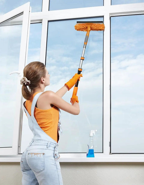 Person using Telescoping Paint Roller Extension Pole With Universal Twist On Metal Tip For Grab And Go Reach Great For Painting Dusting And Window Cleaning Extends From One And A Half To Three Feet Lightweight Yet Sturdy And Easy To Adjust For Hard To Reach Spots on window