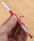 Close-up of Beekeeping Grafting Tools Kit 10 Pack Retractable Needles For Beehive Queen Larva Rearing in hand, 11.5 cm length.
