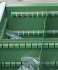 Inside view of Hella Compact Metal Tool Chest Featuring A Knockout Lock And Heavy Duty Steel Frame, showing organized compartments.